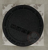 Silicone/rubber tumbler bottom with adhesive backing.